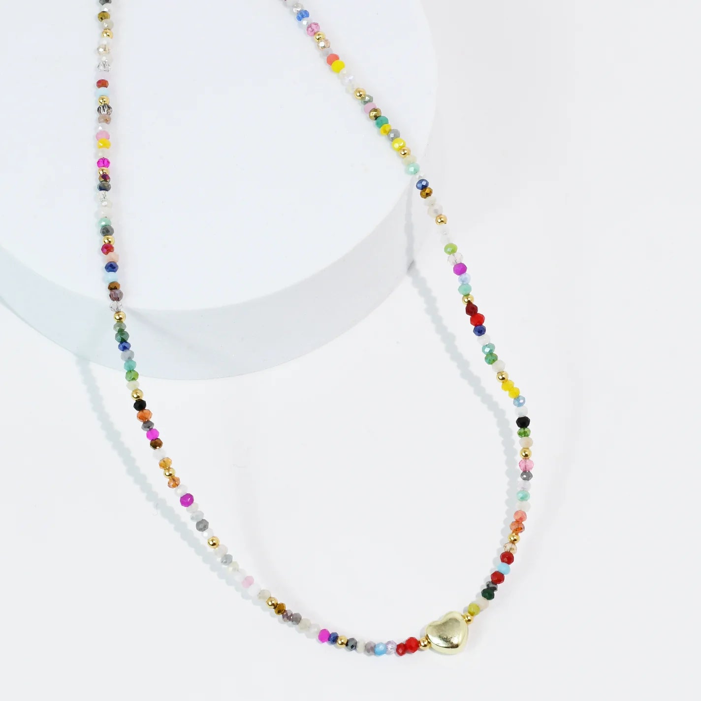 The Tiny Gold Heartbeat Necklace