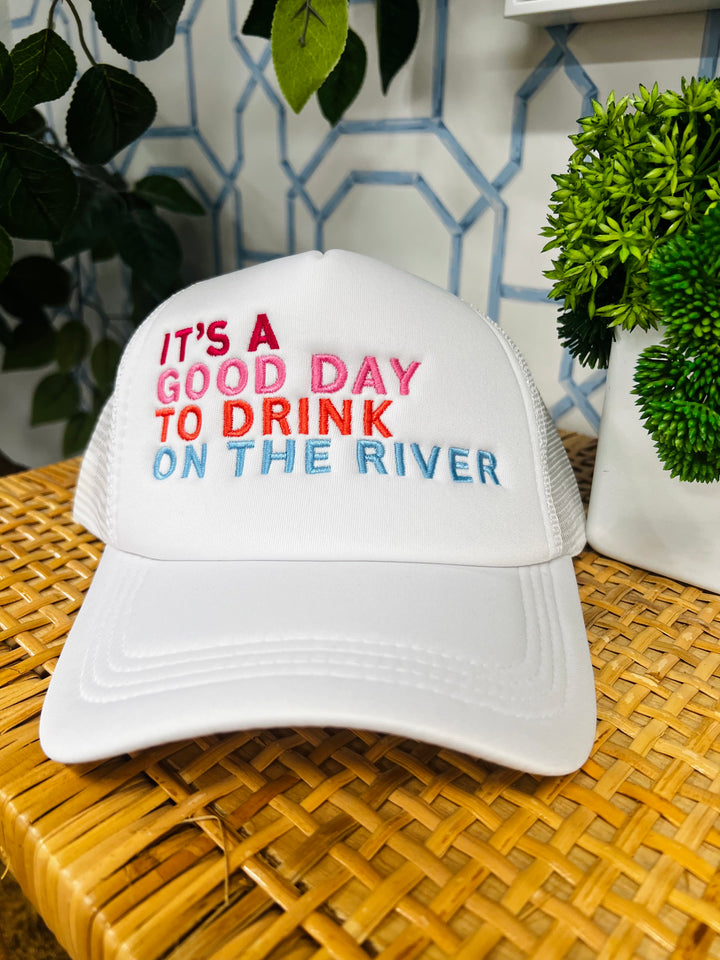 The White Drink On The River Trucker Hat