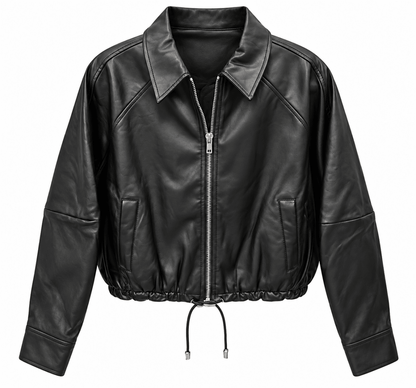 A black faux leather cropped jacket with a silver front zipper, pointed collar, diagonal shoulder seams, and a drawstring hem, shown on a plain white background.