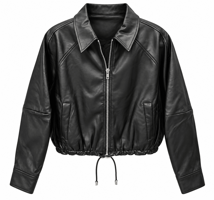 A black faux leather cropped jacket with a silver front zipper, pointed collar, diagonal shoulder seams, and a drawstring hem, shown on a plain white background.