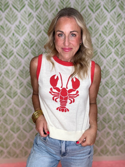 woman standing in a lobster sweater