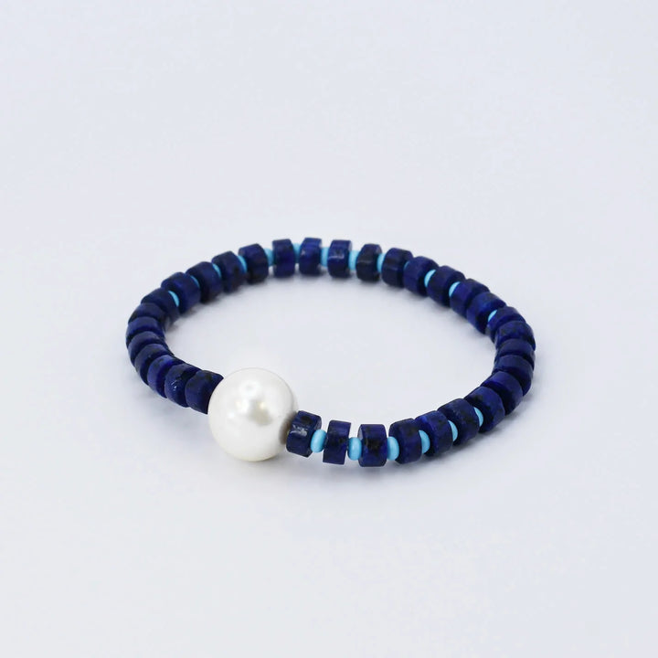 The STEAL Lady in Blue Beaded Bracelet