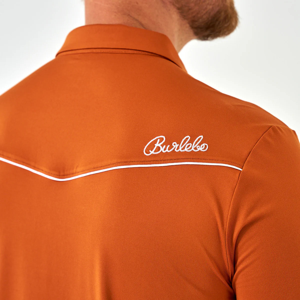 The Burlebo Pearl Snap Performance Polo in 2 Colors