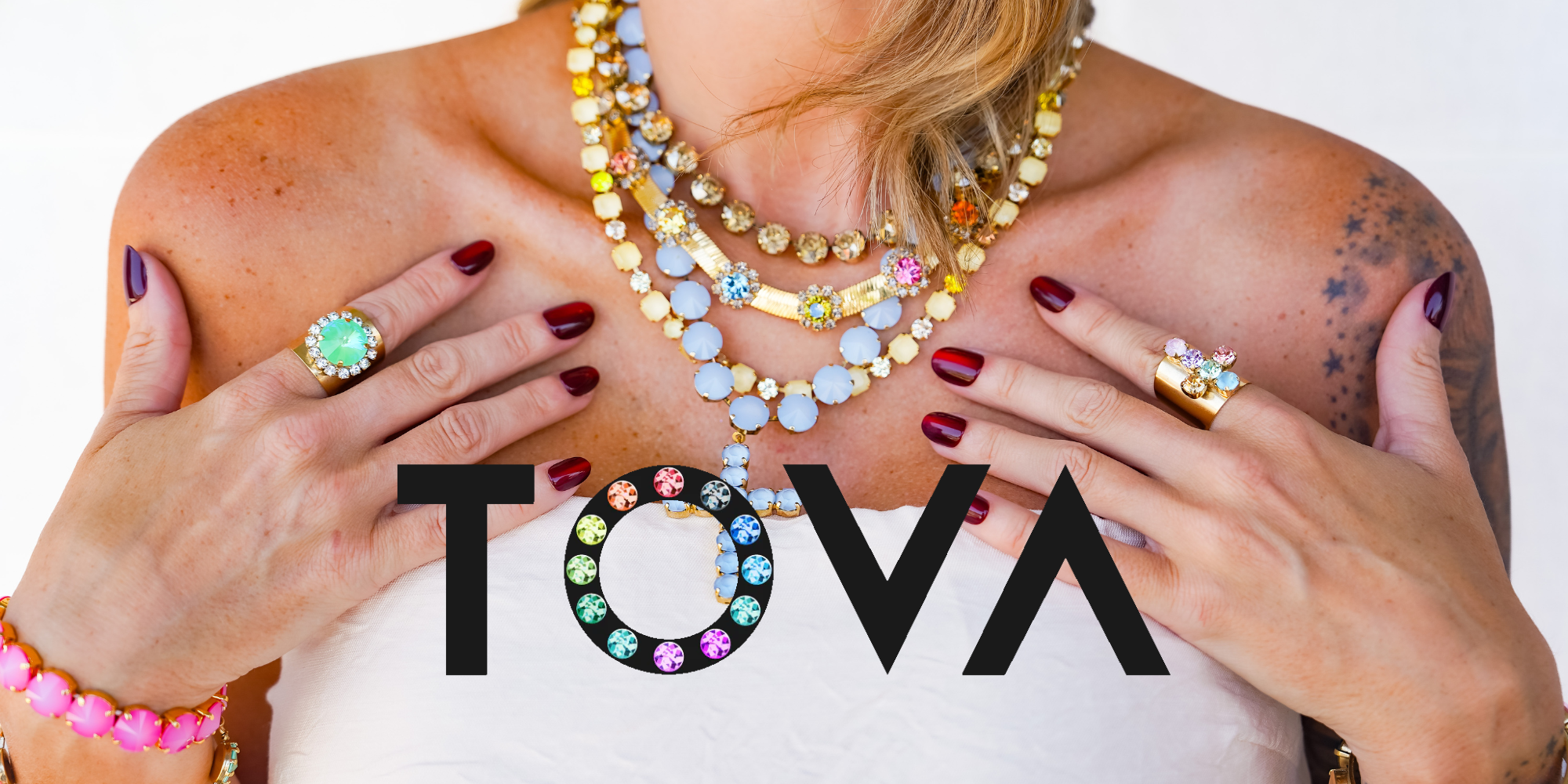 woman with tova jewelry